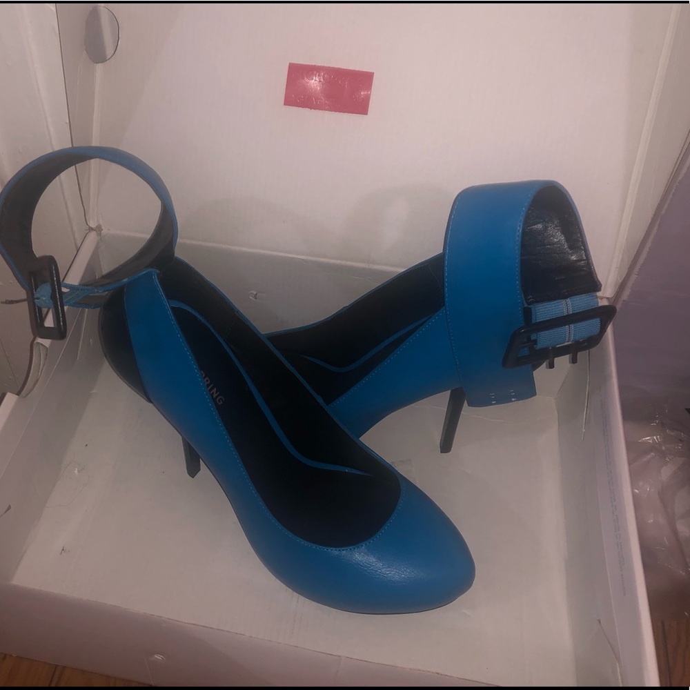 Call it Spring turquoise/black heels